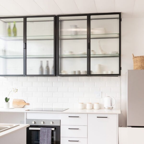 STUDIO DELTA GLASS AND STEEL KITCHEN CABINET IN BLACK